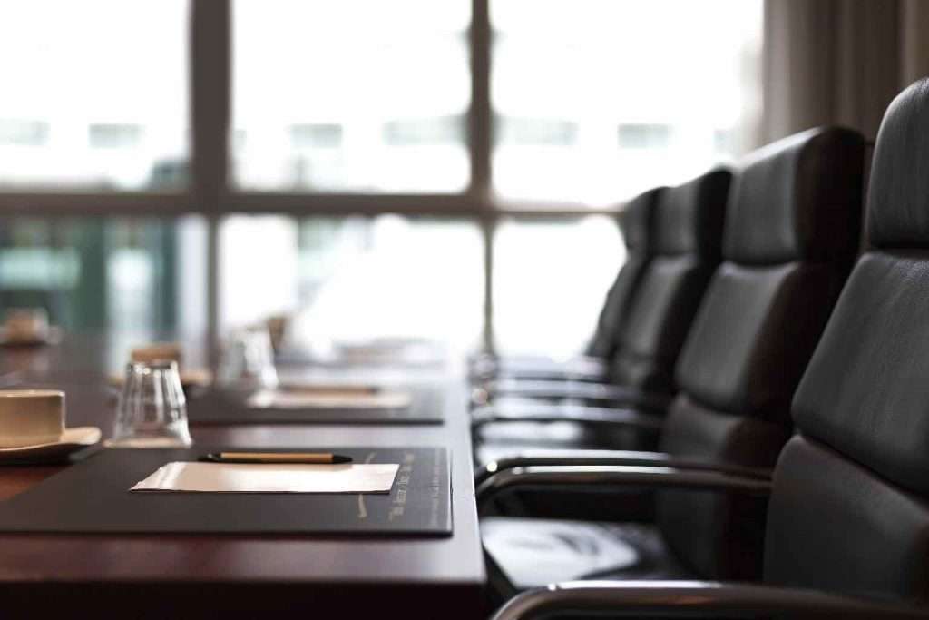 Empty executive chairs in a meeting room